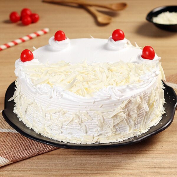 Delight in Delicate Flavors - Order White Forest Cake Online for Fast Delivery!